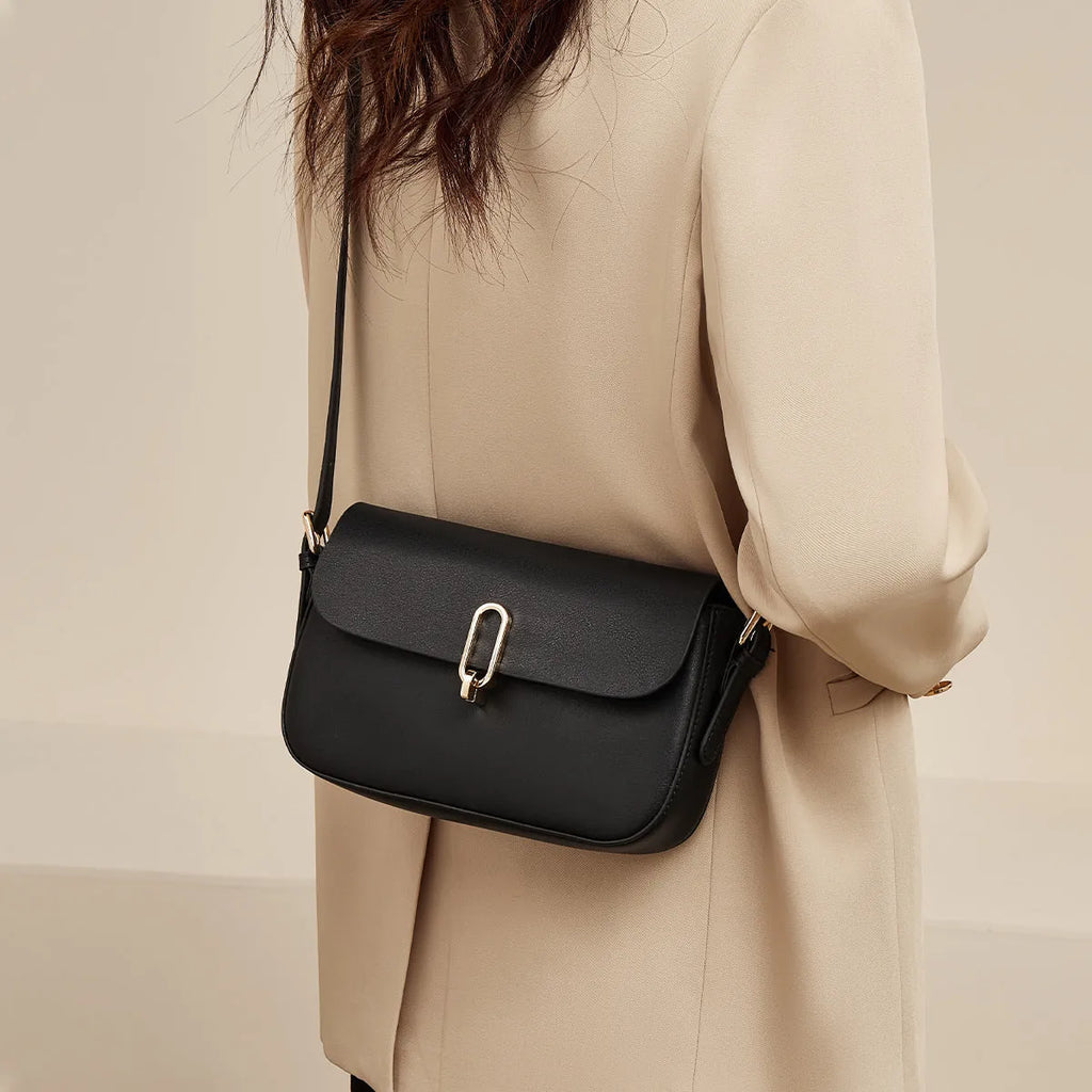 Two-layer cowhide genuine leather square shoulder messenger bag in black with lock detail and zipper change pocket