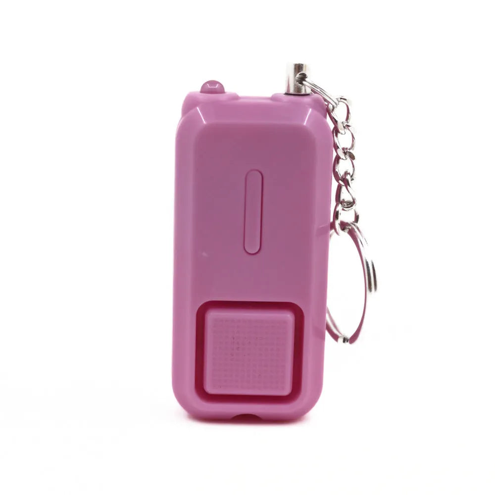 ZQ-202 personal safety alarm in pink, black, white, yellow, and green colours next to LR44 batteries.
