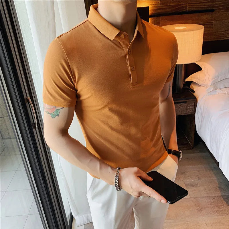 Slim-fit solid colour polo shirt with lapel collar and short sleeves on a hanger.