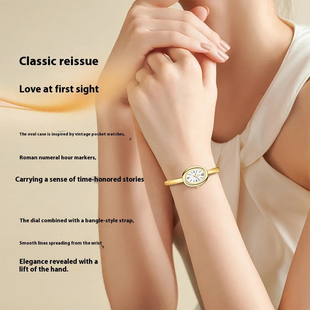 Women's oval-shaped retro quartz watch in gold colour with a thin 8mm case.