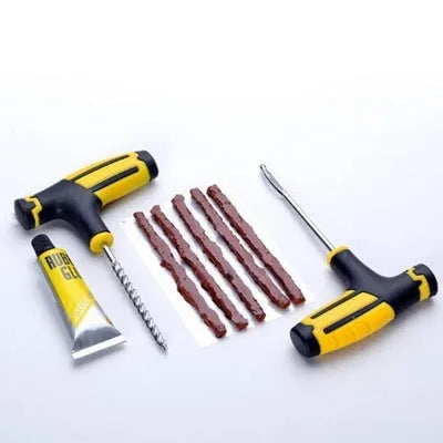 Vacuum tyre repair tool set with probe, rubber strips, adhesive, and plastic case for motorcycle and car tyres