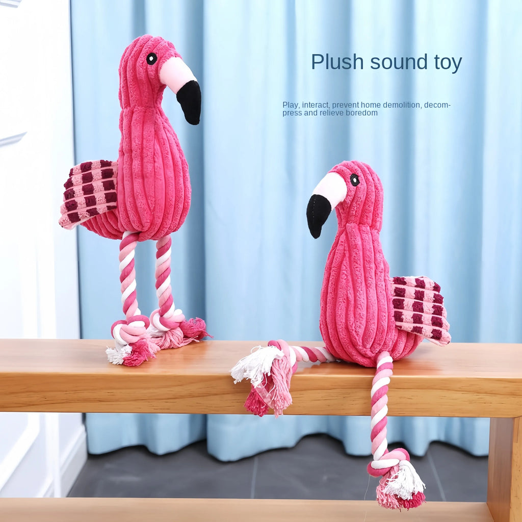 Pink animal-shaped plush dog toy with corduroy fabric and internal squeaker for small and large breed dogs