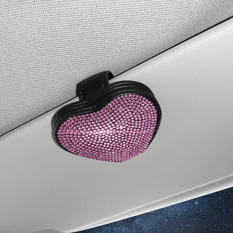 Black diamond-encrusted PU leather magnetic storage clip for car sun visor, holding sunglasses.