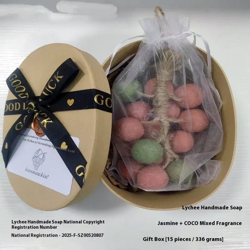 Grape handmade soap bars in black, green, purple and litchi variants showing mesh bag, gift box and long case packaging.