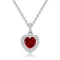 Heart-shaped sterling silver pendant necklace with a natural gemstone on an adjustable chain.