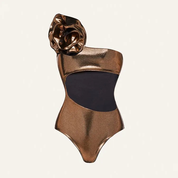 Gold coloured one-piece swimsuit with halter neckline on a model.