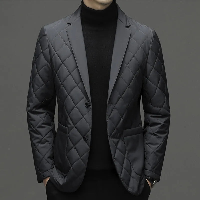 Man wearing a solid colour thickened lapel down jacket with side seam pockets.