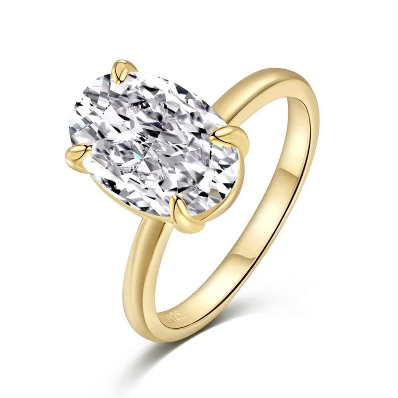 Oval 9 silver women's ring with four-claw setting holding a hand-cut gemstone.