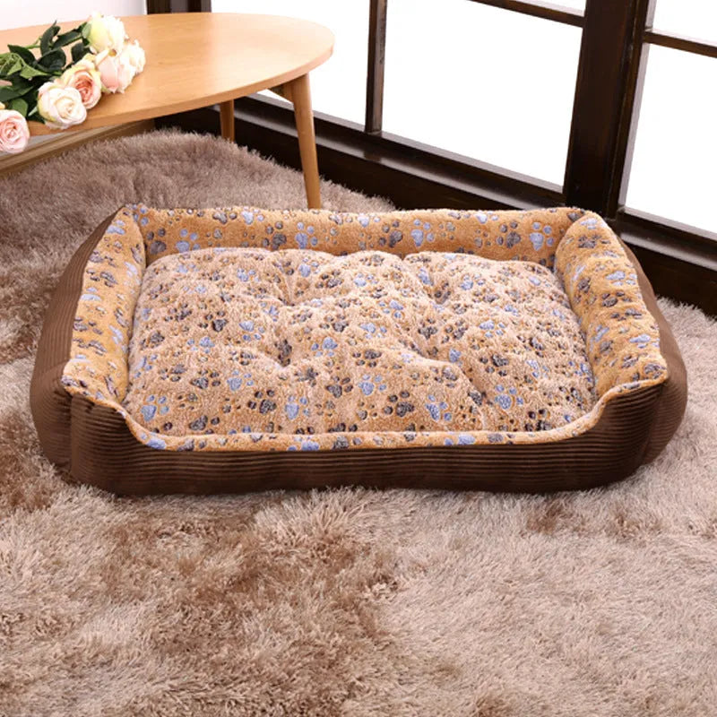 Soft beige plush dog bed with raised sides in a sofa-style design for small pets.