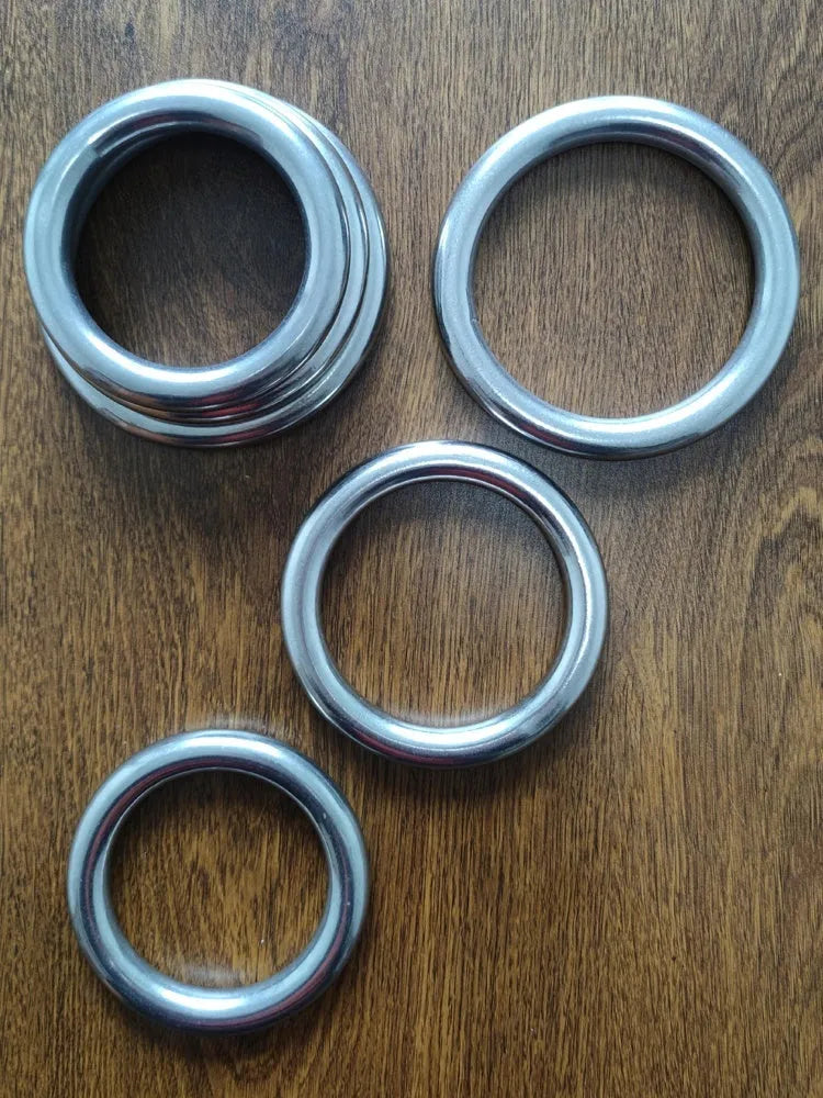 Wing Chun carbon steel power training ring shown in three different sizes for martial arts conditioning.