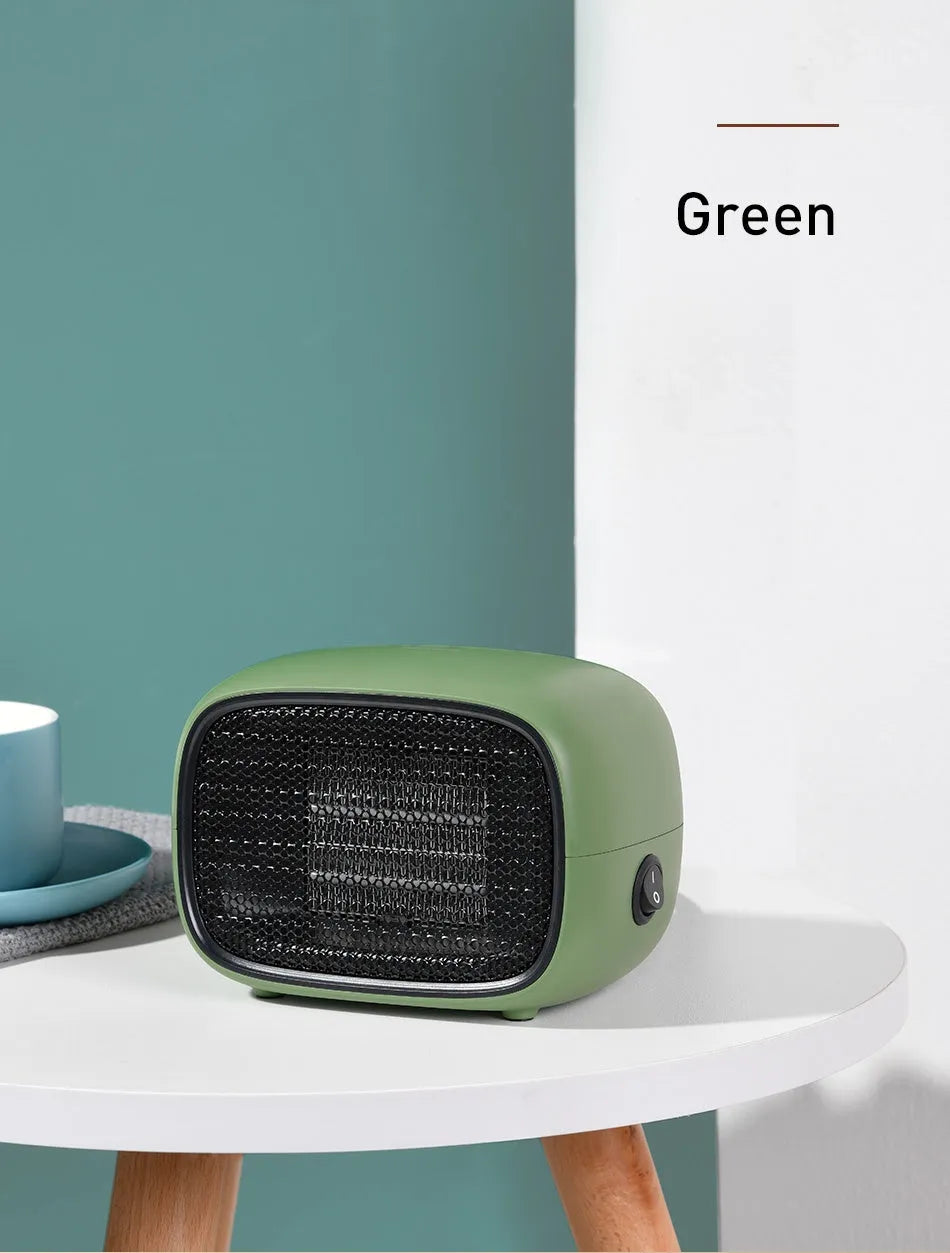 Compact green ceramic PTC heater with metal mesh front measuring 158mm long
