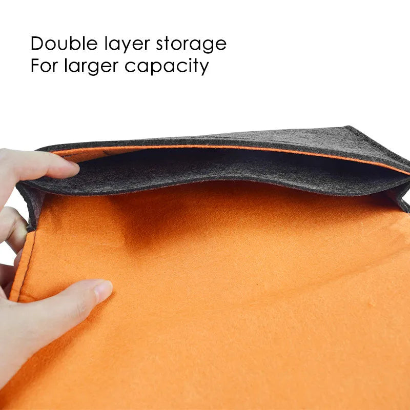Black felt pouch for Nintendo Switch open to show console compartment and five game card slots