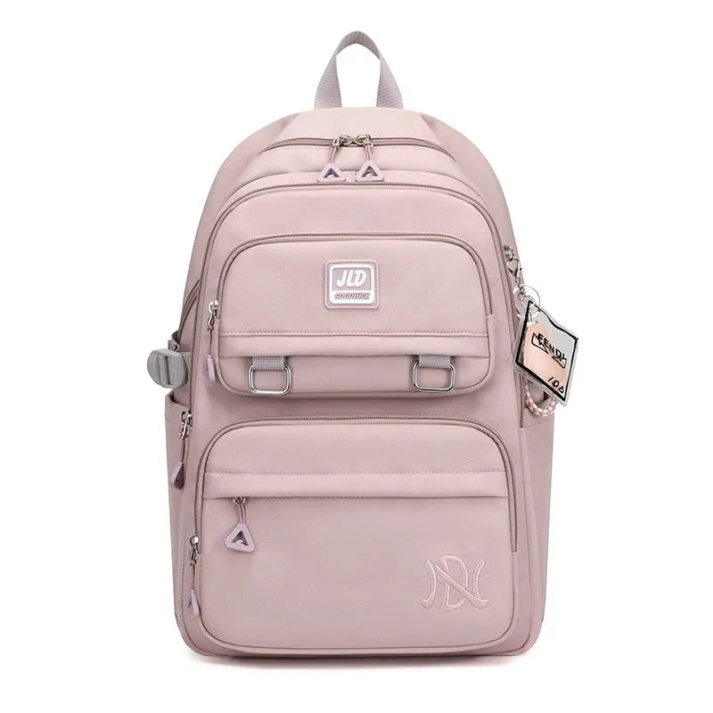 Girls large capacity nylon school backpack in purple with waterproof anti-theft features and breathable back panel