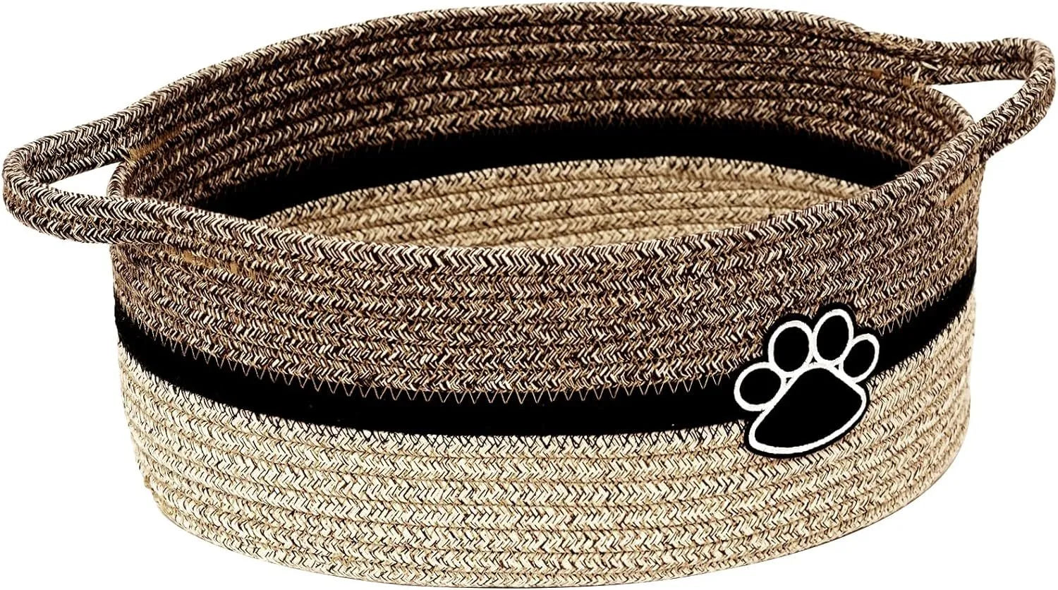 Light beige handmade cotton rope storage basket with wooden handle on a table.