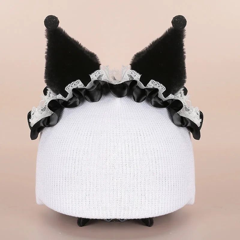 A plush fabric cartoon character helmet hat cover with attached ears on a white background.