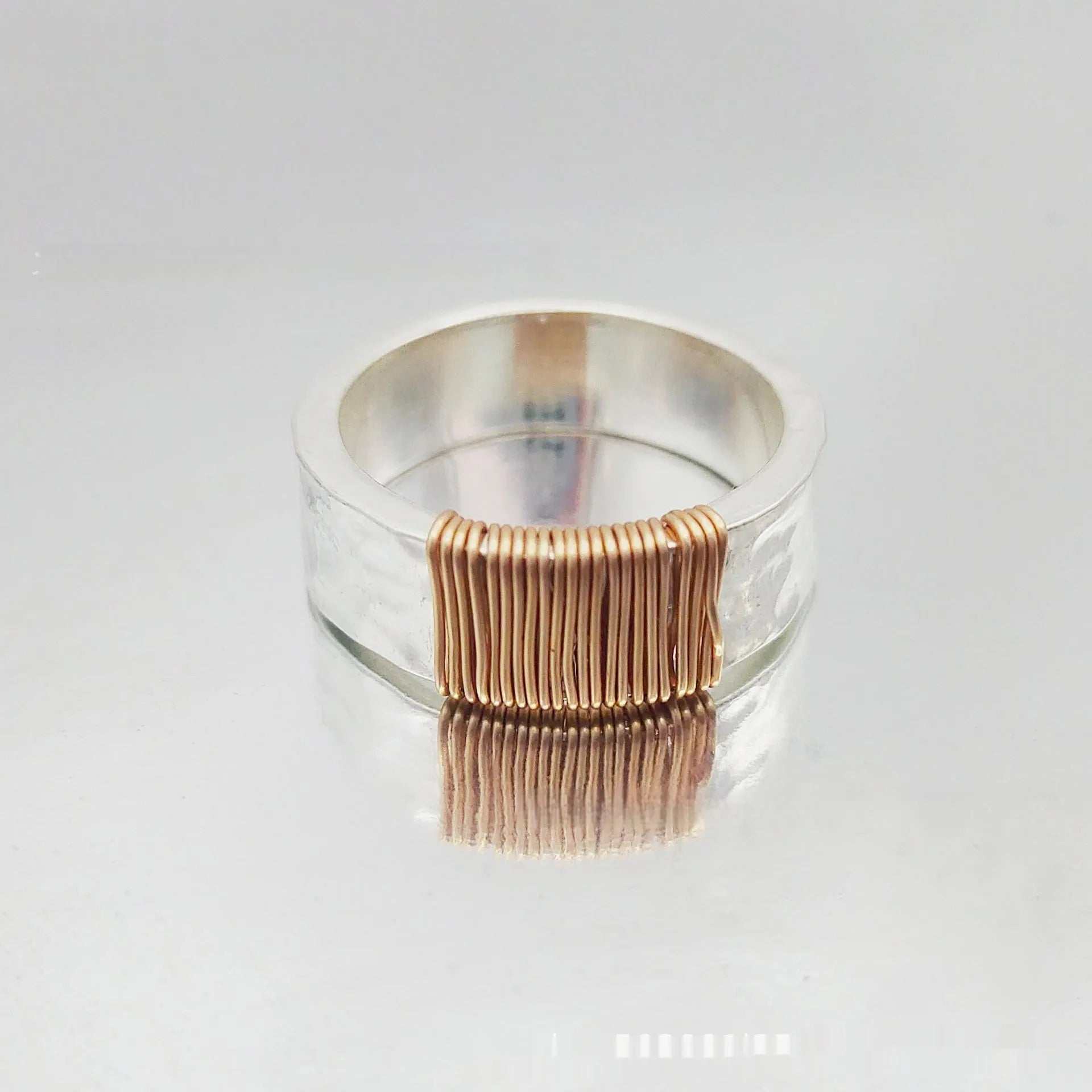 Copper simple bracelet with a geometric vintage ring design in a silver gold electroplated finish.