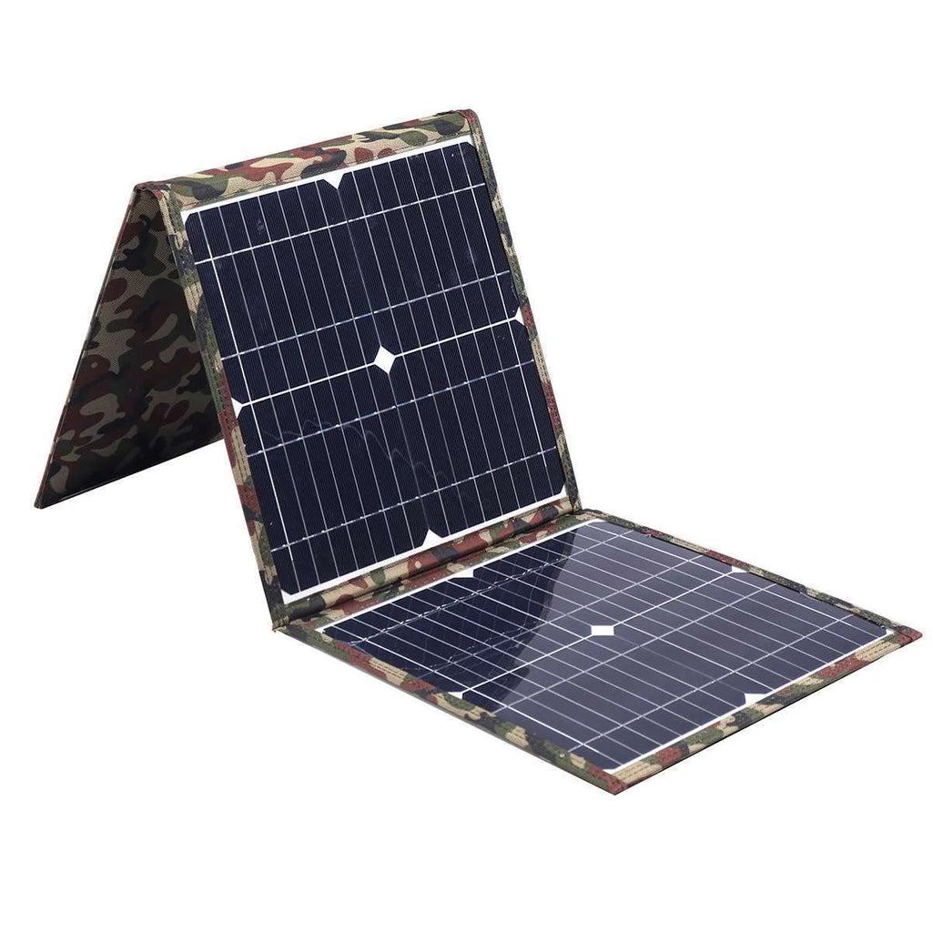 Black foldable portable solar panel unfolded, showing three monocrystalline cells, with included car charger and cables.