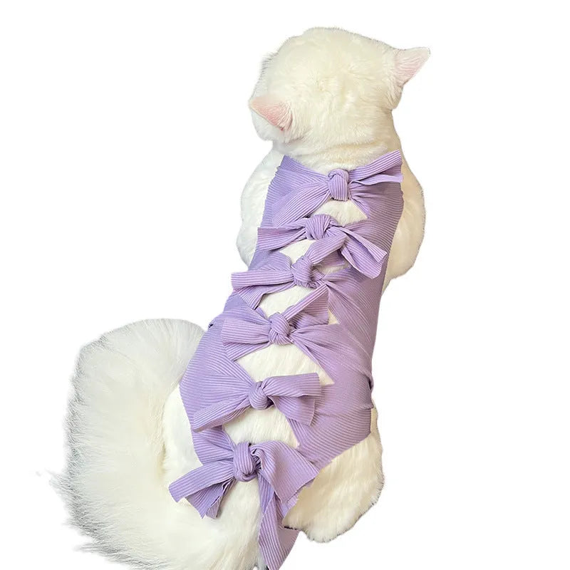 Lace-up polyester cat sterilisation recovery garment shown in blue, brown, green pineapple, pink, or purple