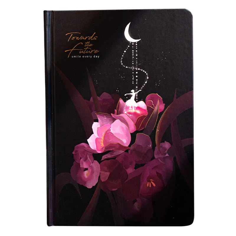 A5 spiral-bound notebook with a luminous holographic cover showing colour illustrations on the open pages.