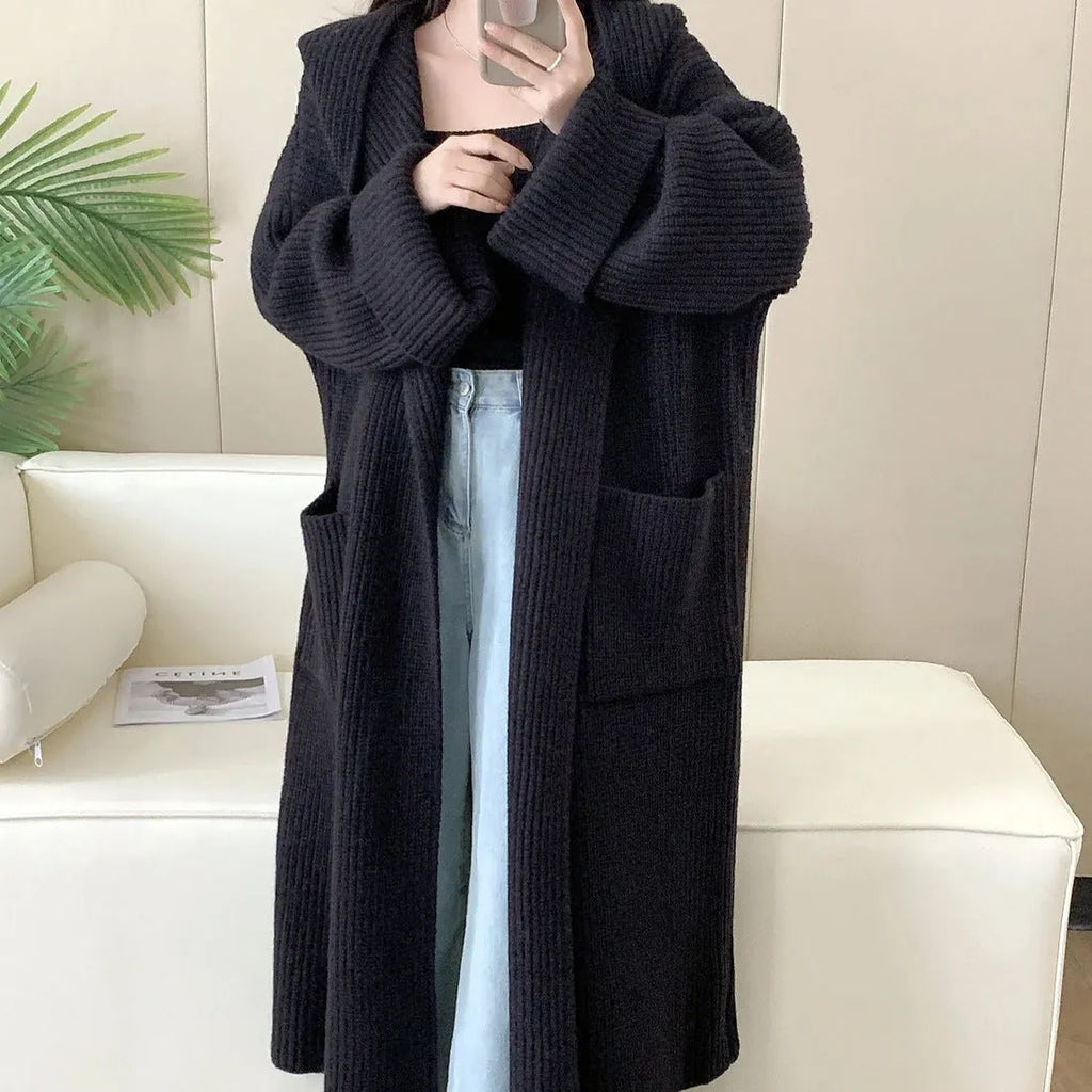 Women's loose hooded cardigan coat in acrylic fibre with extended length and raglan sleeves