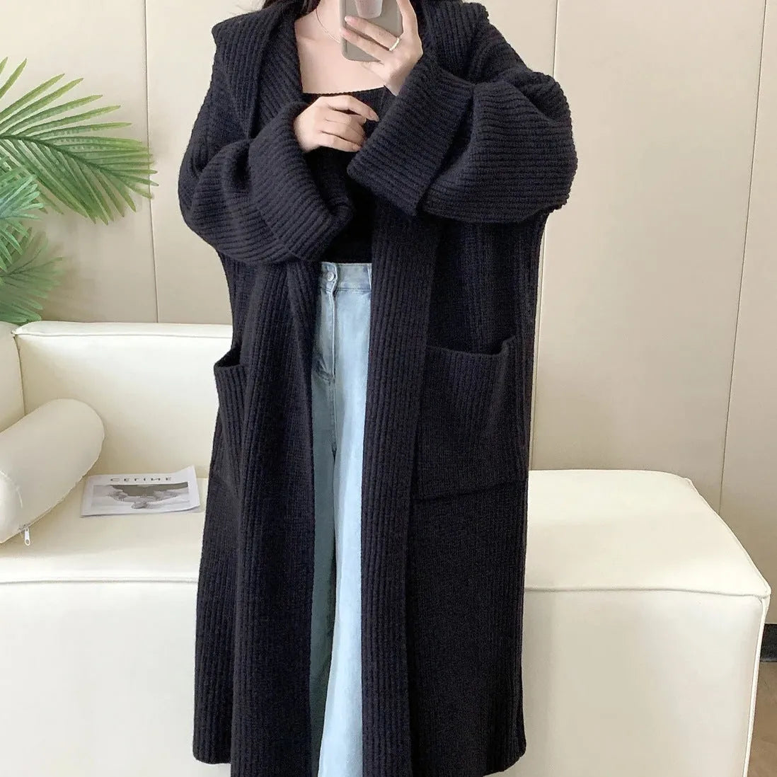 Women's loose hooded cardigan coat in acrylic fibre with extended length and raglan sleeves