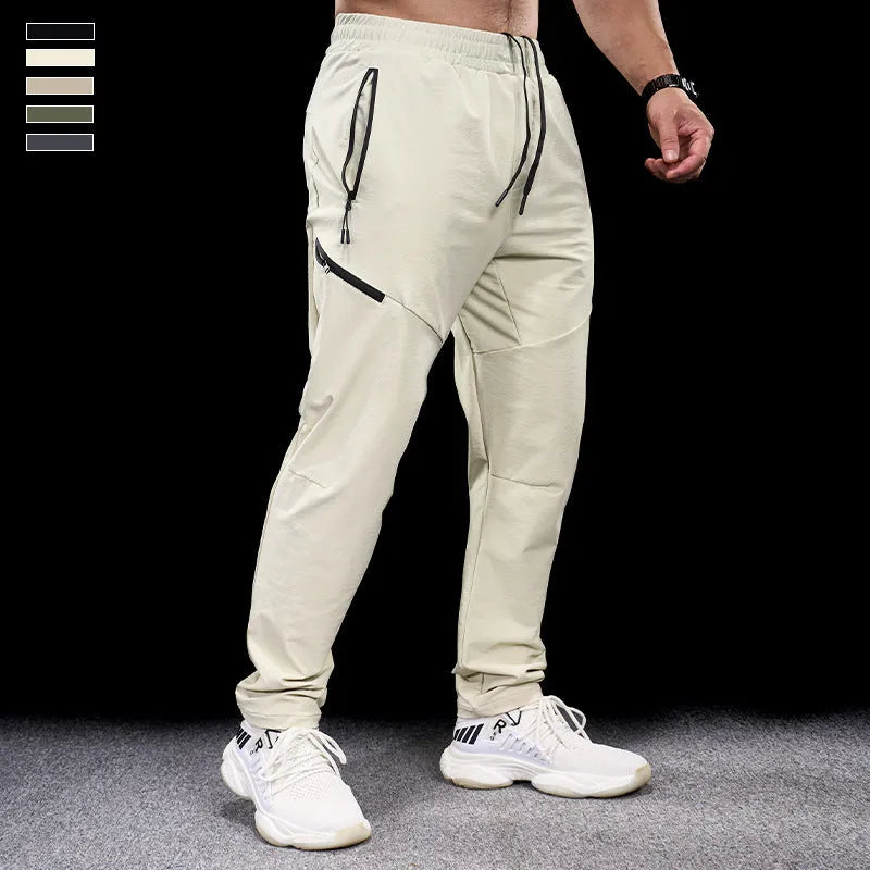 Men's waterproof quick-dry workout trousers in nylon fabric for sports and fitness