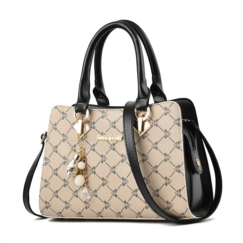 Geometric pattern ladies messenger bag in textured PU leather with zipper closure and interior card slots