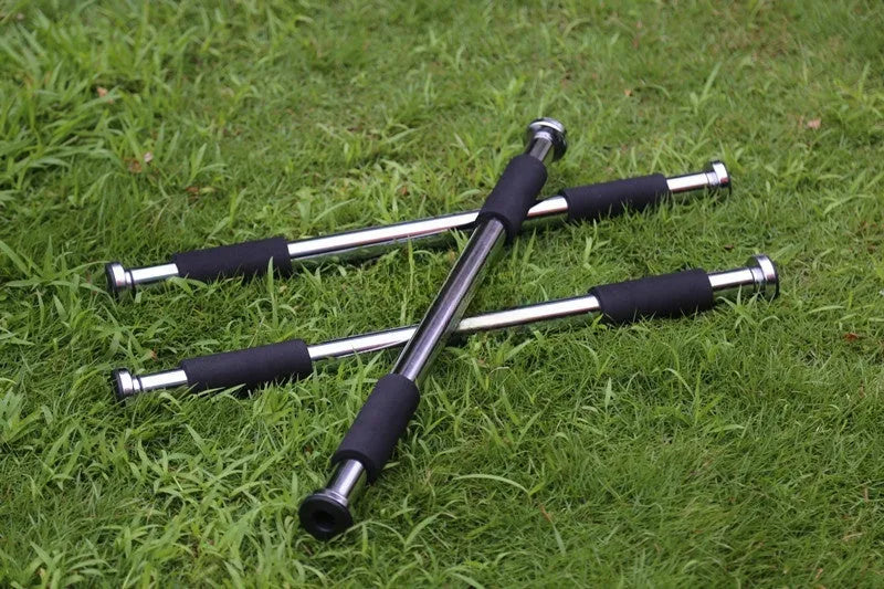 Steel adjustable pull-up bar extended for doorframe installation, showing parallel grips.