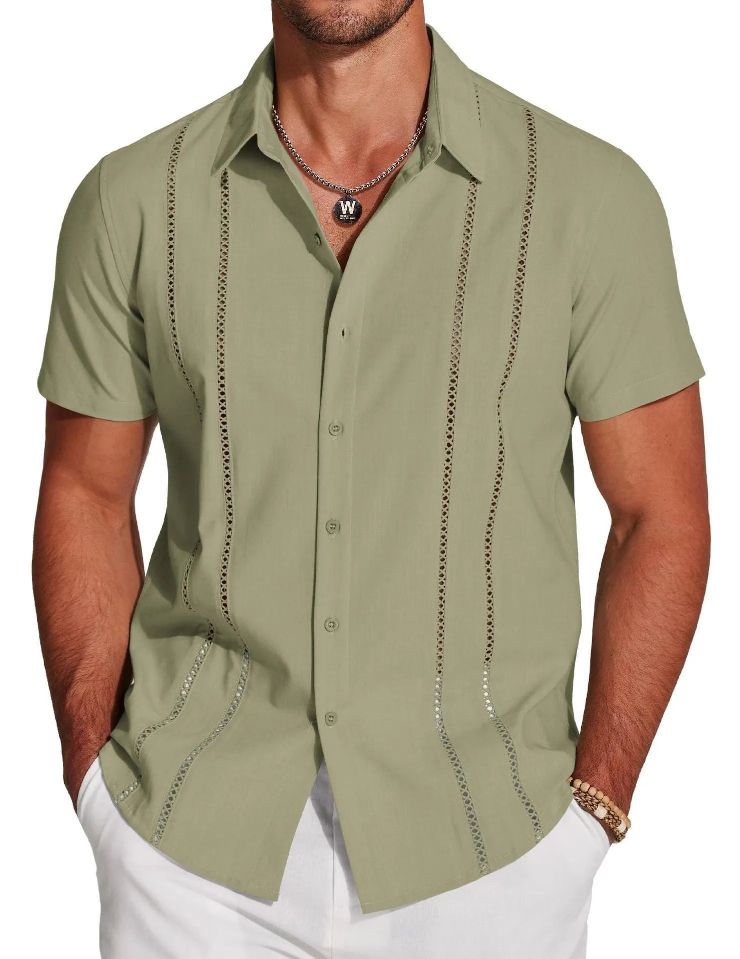 Man wearing a slim fit, short sleeve Hawaiian shirt with a digital print pattern in a casual setting.