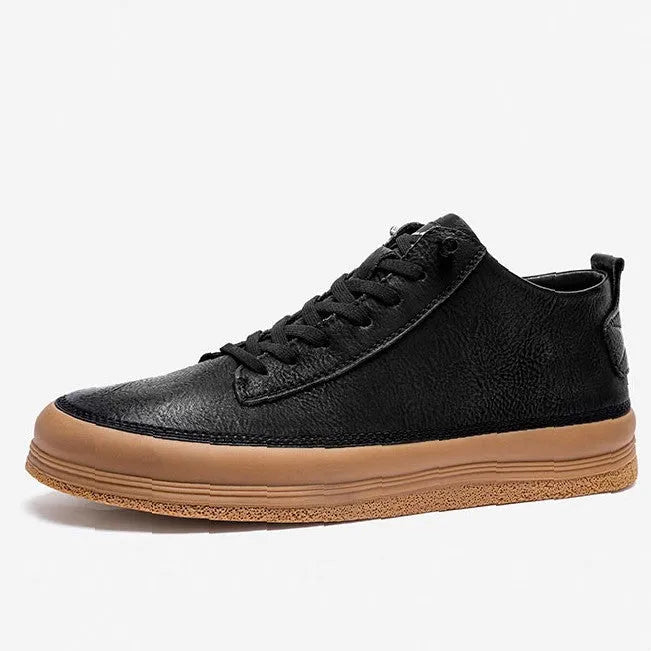 Men's black leather casual shoes with white stitching and lace closure on a white rubber sole