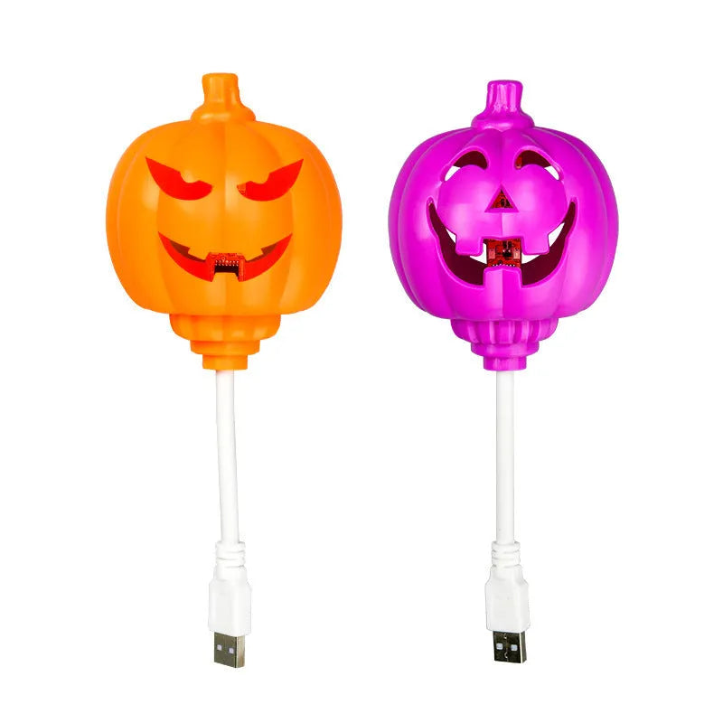 Plastic pumpkin-shaped decorative lamp with USB cable, showing purple or yellow light option.