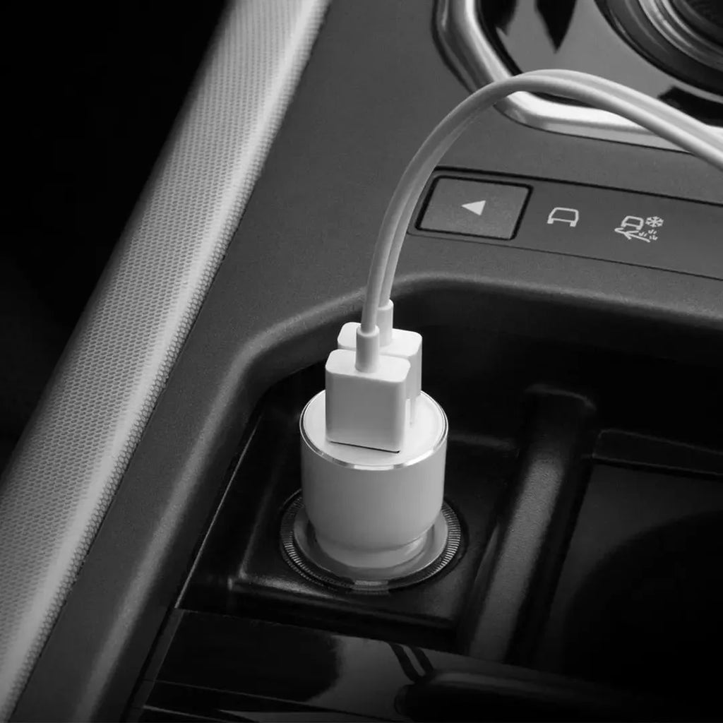 Black Ruimi 3S Bluetooth car charger showing dual USB ports and compact 26.5mm square design