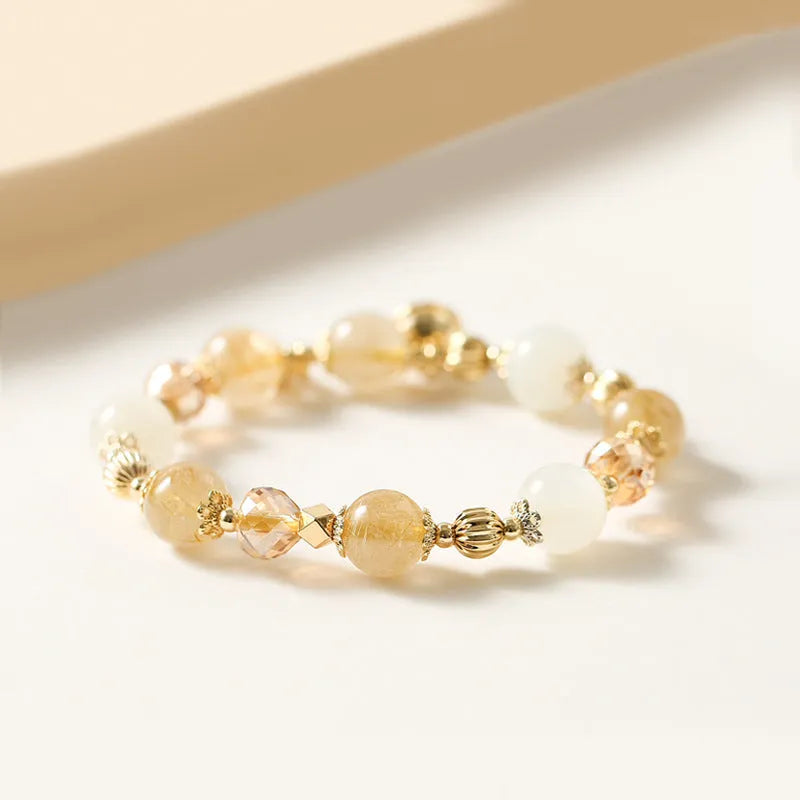 Gold-coloured rutilated quartz bracelet with Korean style design and electroplated crystal construction