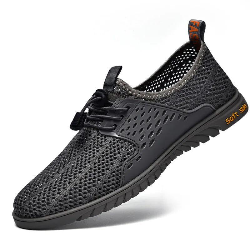 Men's black breathable mesh casual shoes with elastic band fastening and flat rubber sole