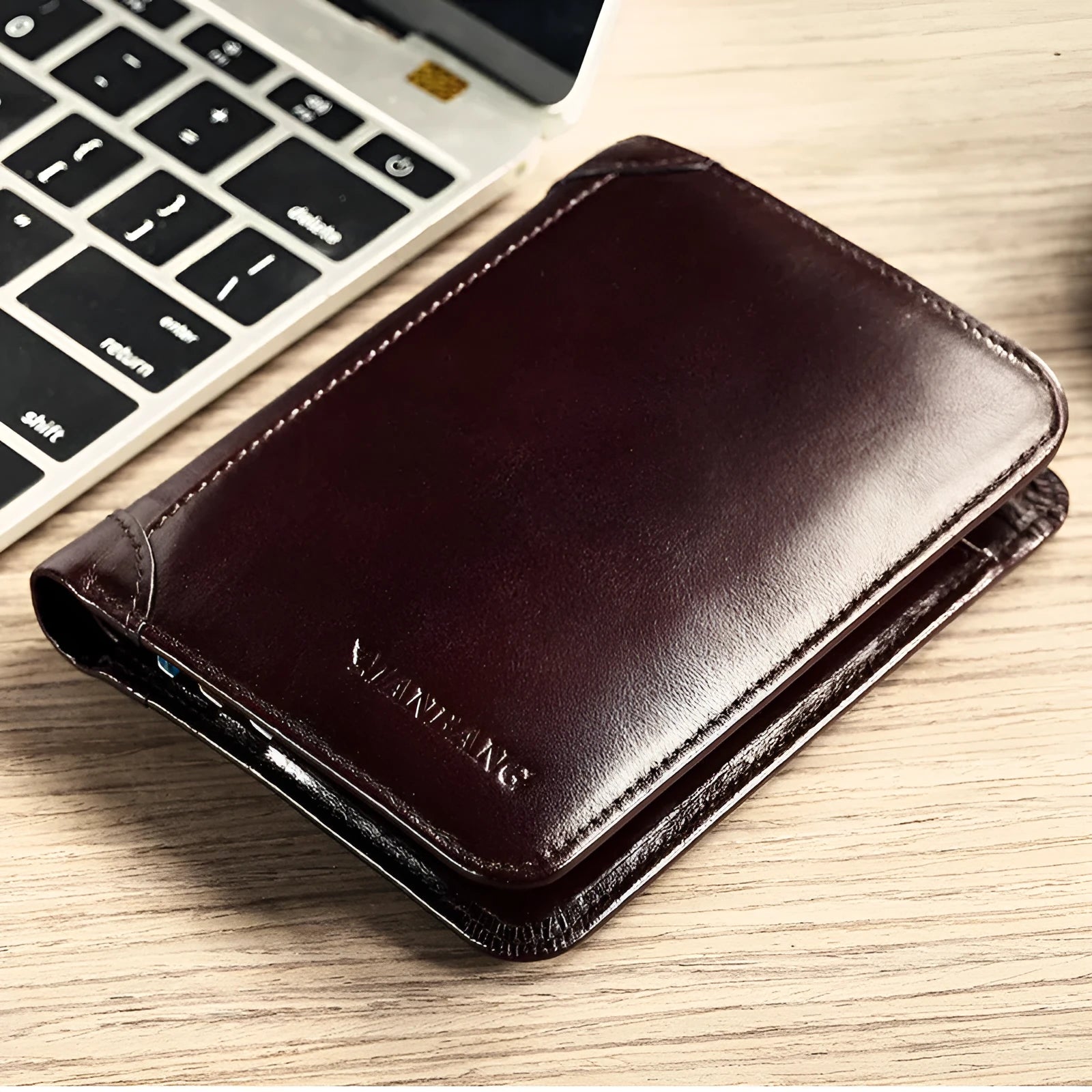 Men's black leather bifold wallet open to show internal card slots, photo window, coin pocket, and banknote compartment.