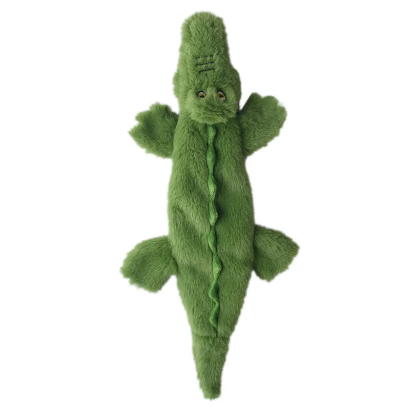 Green crocodile plush dog toy with stuffing-free construction and squeaker sound feature