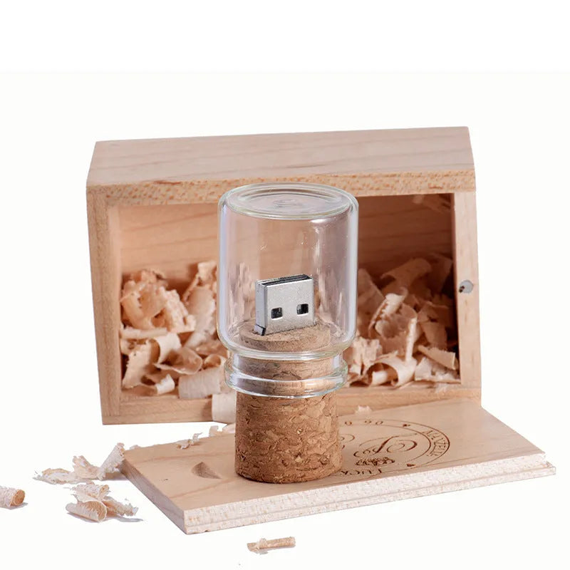 Personalised wooden drift bottle-shaped USB flash drive showing custom graphic on its side.