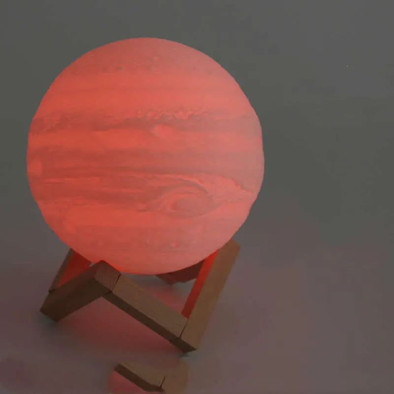 3D printed spherical moon lamp on a wooden stand with touch ring control