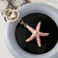 Ocean Series starfish keychain with electroplating finish in blue colour for luggage decoration