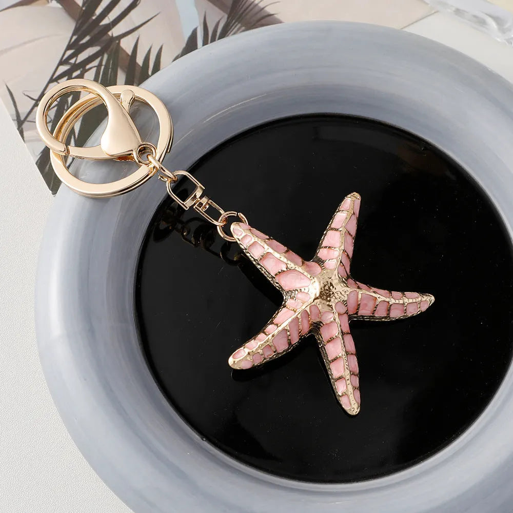 Ocean Series starfish keychain with electroplating finish in blue colour for luggage decoration