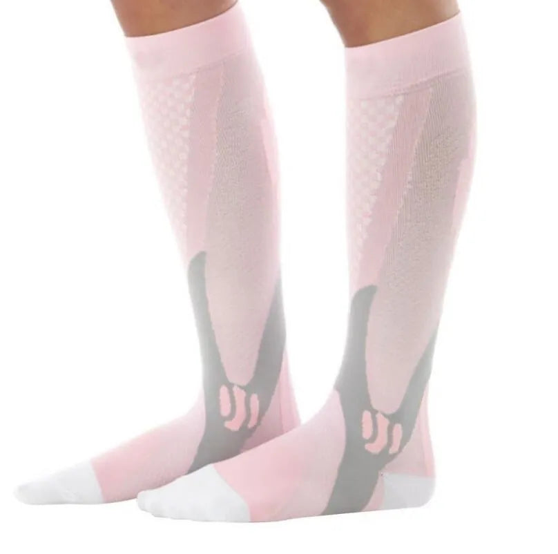 Black graduated compression socks with athletic fit for men and women, shown laid flat.