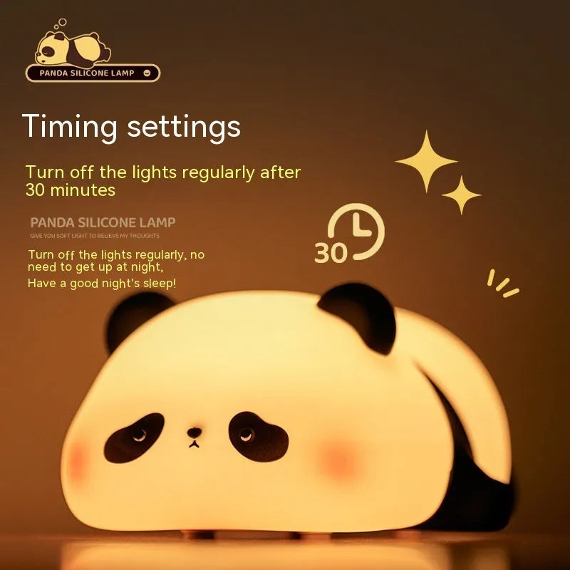 Cartoon panda-shaped night light with soft silicone construction and warm white LED glow