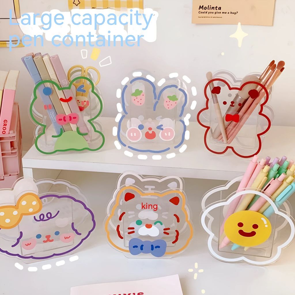 Clear square acrylic storage box with a cute decorative pattern, for stationery on a desk.