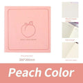 Square notebook with textured faux leather cover showing French fold binding and open blank pages