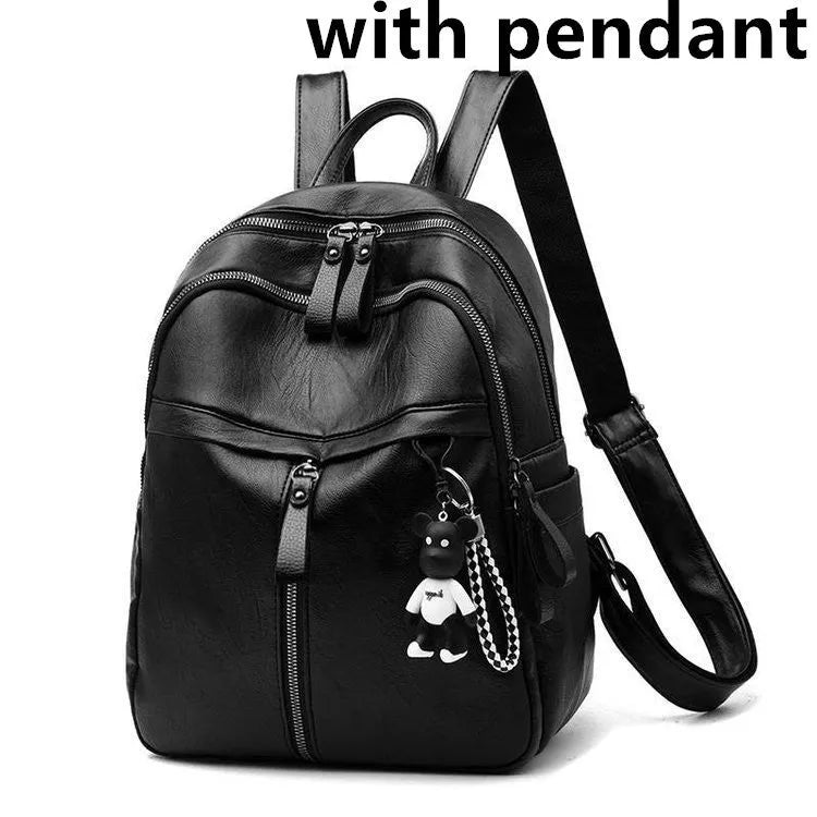 Medium black PU leather backpack with double straps showing plain pattern design