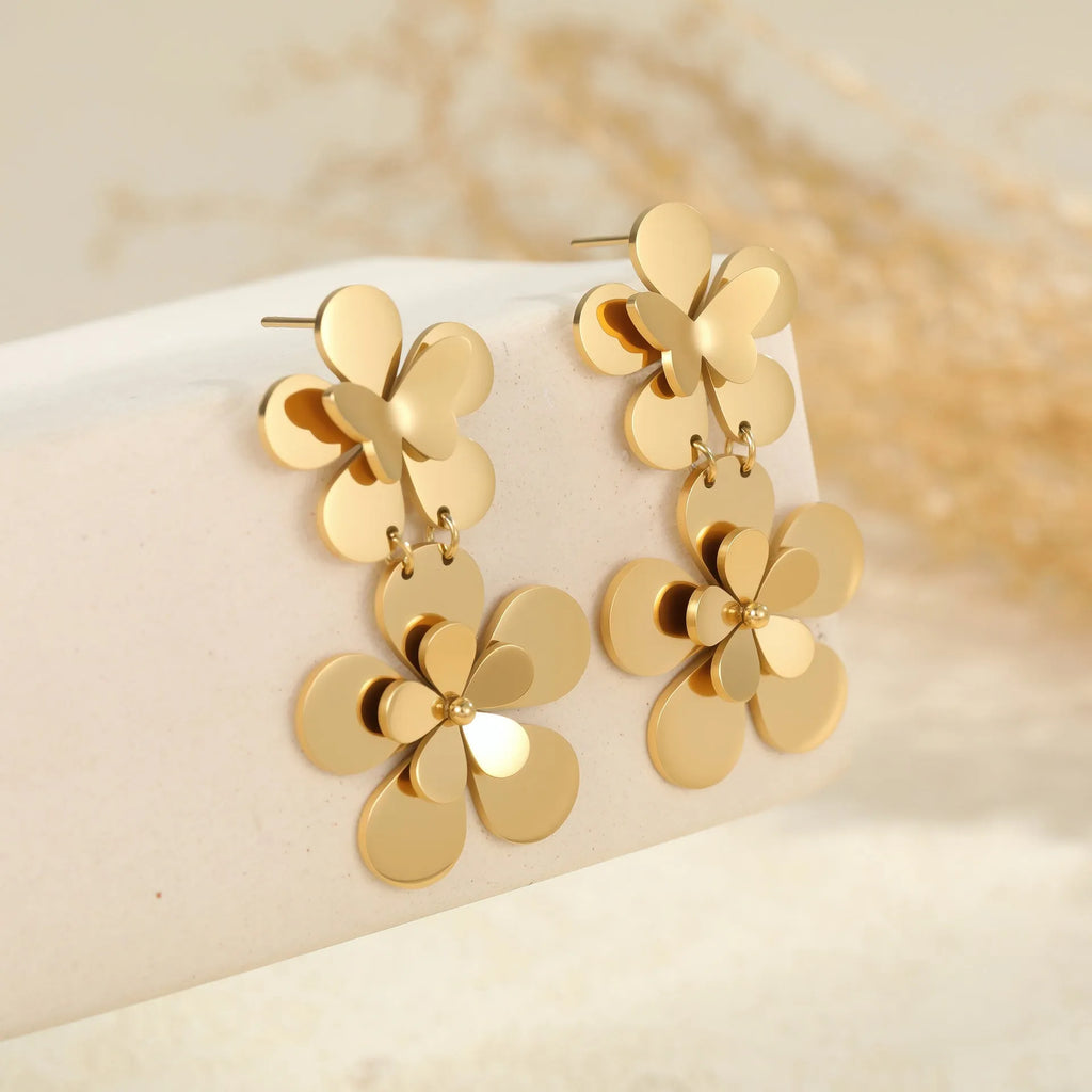 Gold-coloured butterfly earrings with flower and geometric designs for women