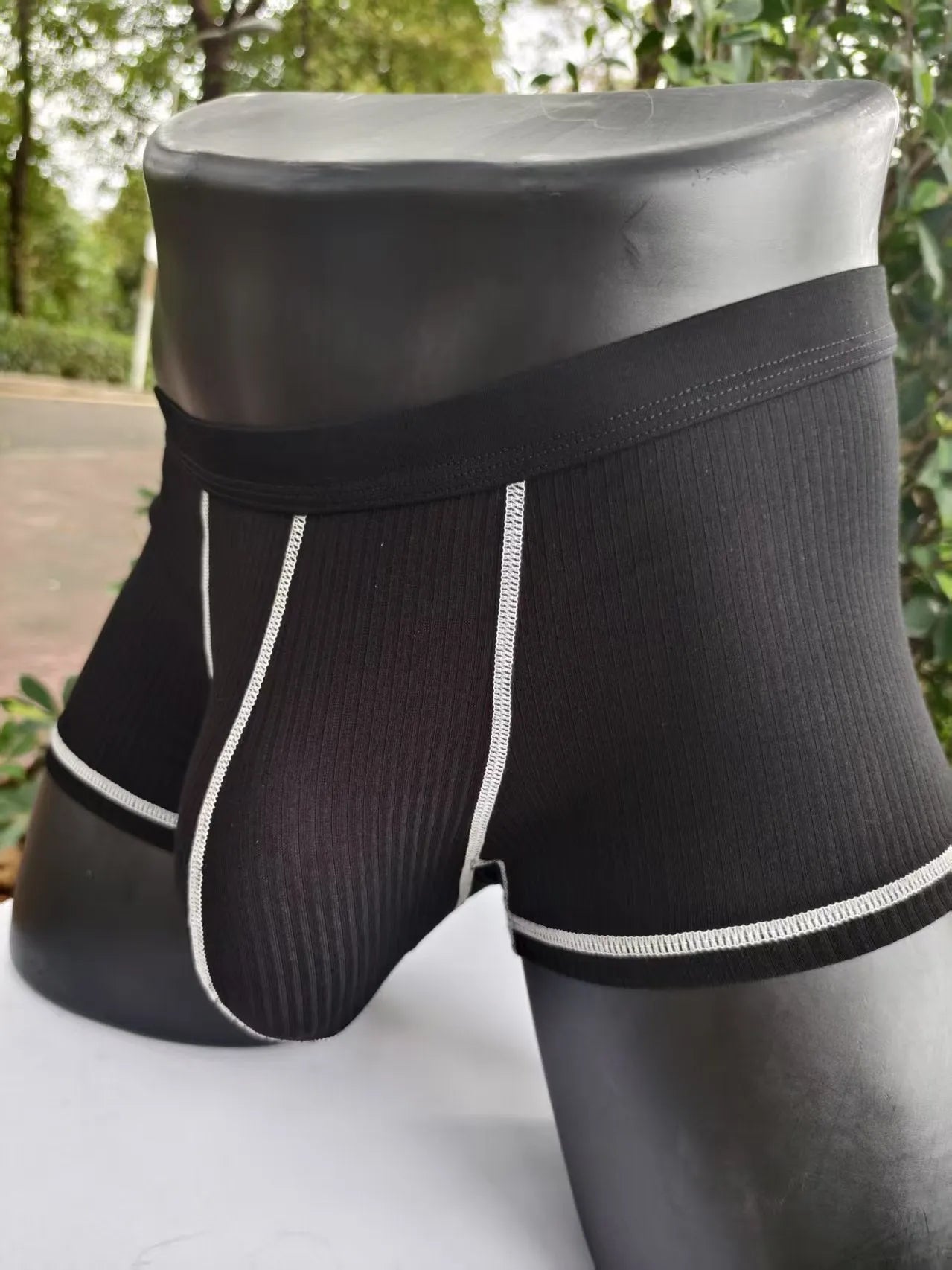 Men's solid colour breathable boxers in army green, shown flat.