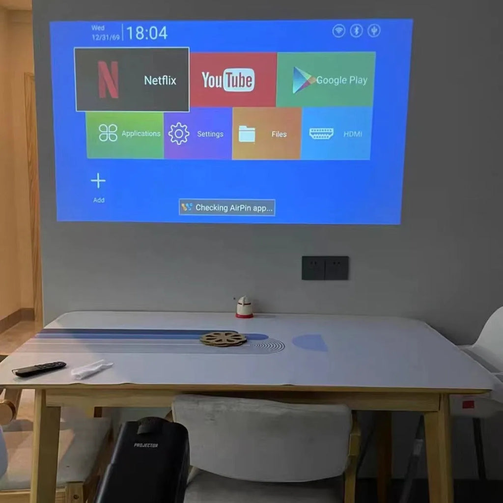 Wireless HD game machine projector for home use with gaming consoles.