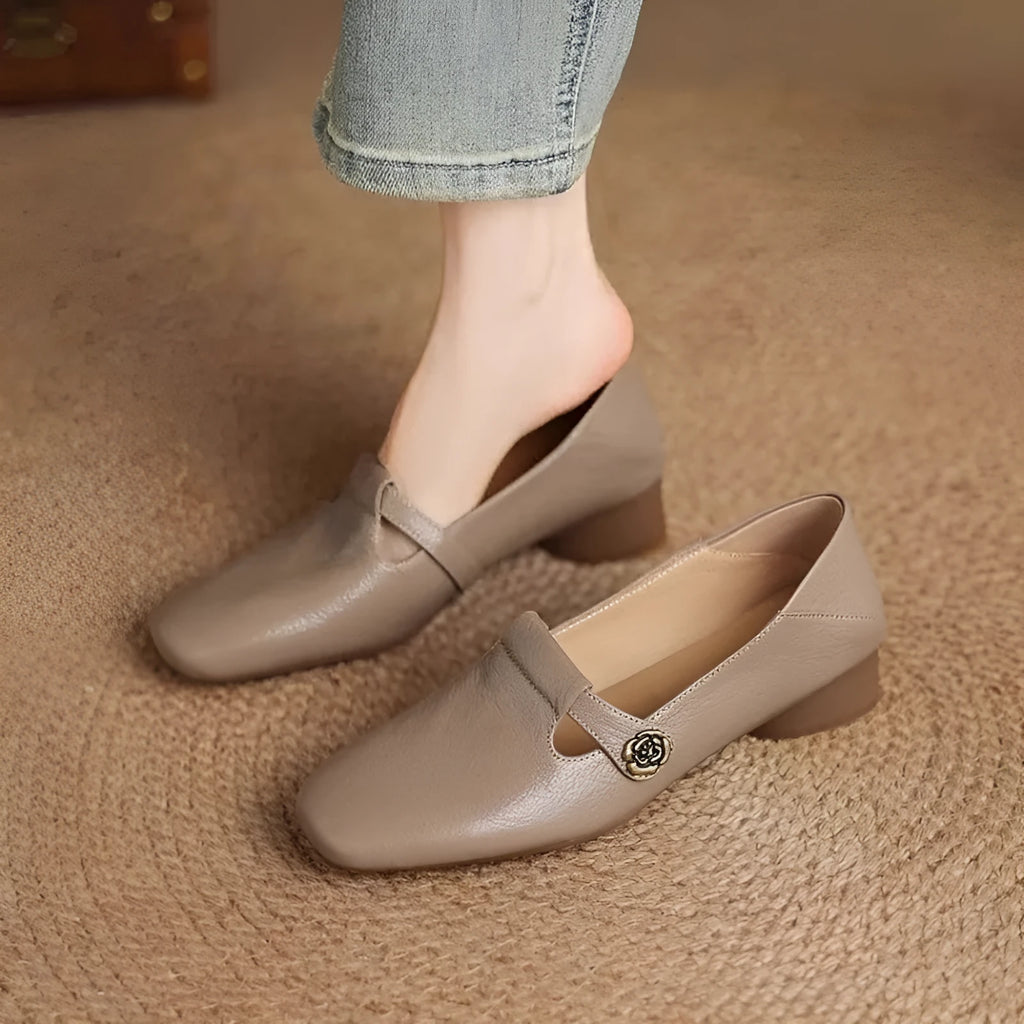 Retro square head genuine leather women shoes in beige with mid heel and square heel on a grey background