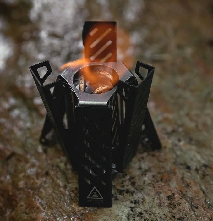 Mini hexagon alcohol stove for camping with foldable portable design in black colour